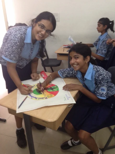 Students participating in ISA art workshop
